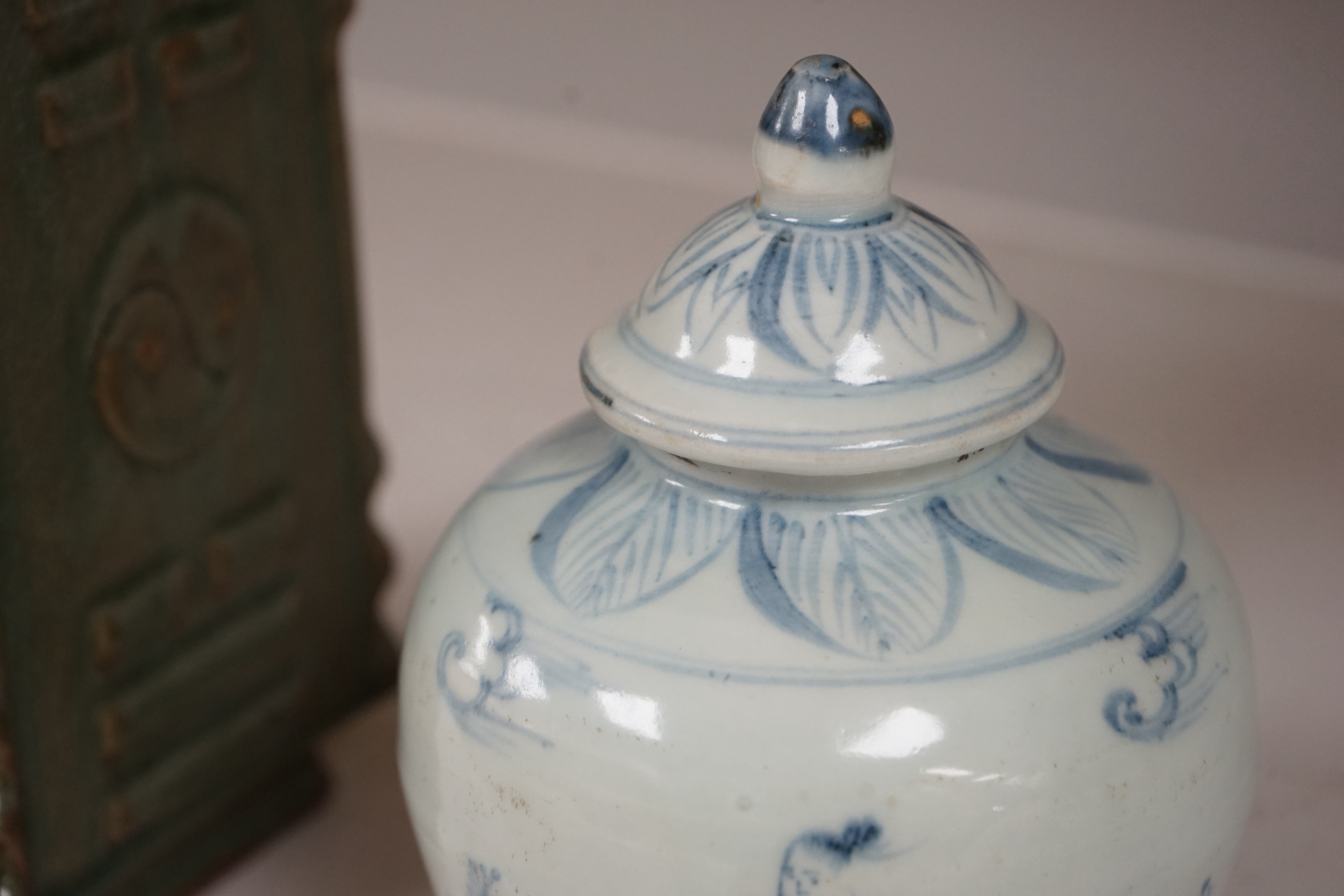 A Chinese celadon glazed cong vase and a blue and white jar and cover, tallest 22cm. Condition - good